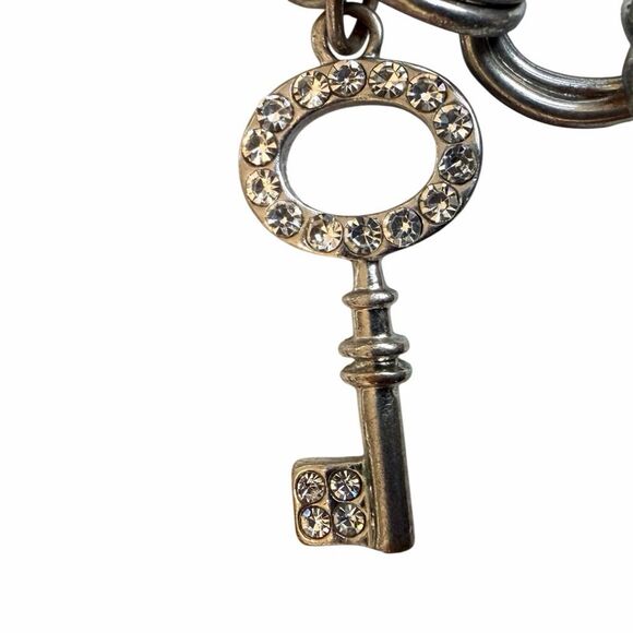 GUESS Silver Tone Heart Charm Bolo Bracelet with Rhinestones - Picture 11 of 11